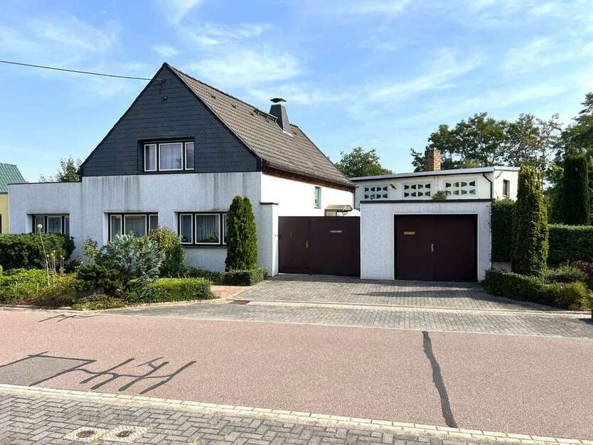 Haus zum Kaufen in Bitterfeld-Wolfen Holzweißig 98.000 € 138.37 m²