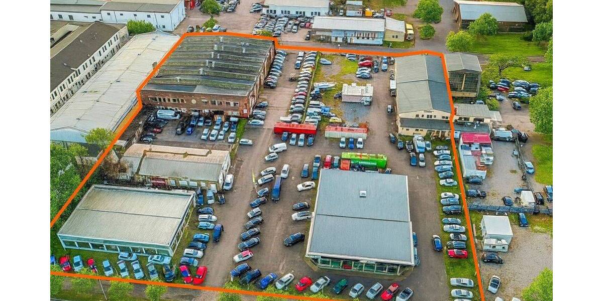 Gewerbegrundstück mit 2 Autohäusern I Lagerhallen I Werkstattgebäude I Freiflächen zimmer