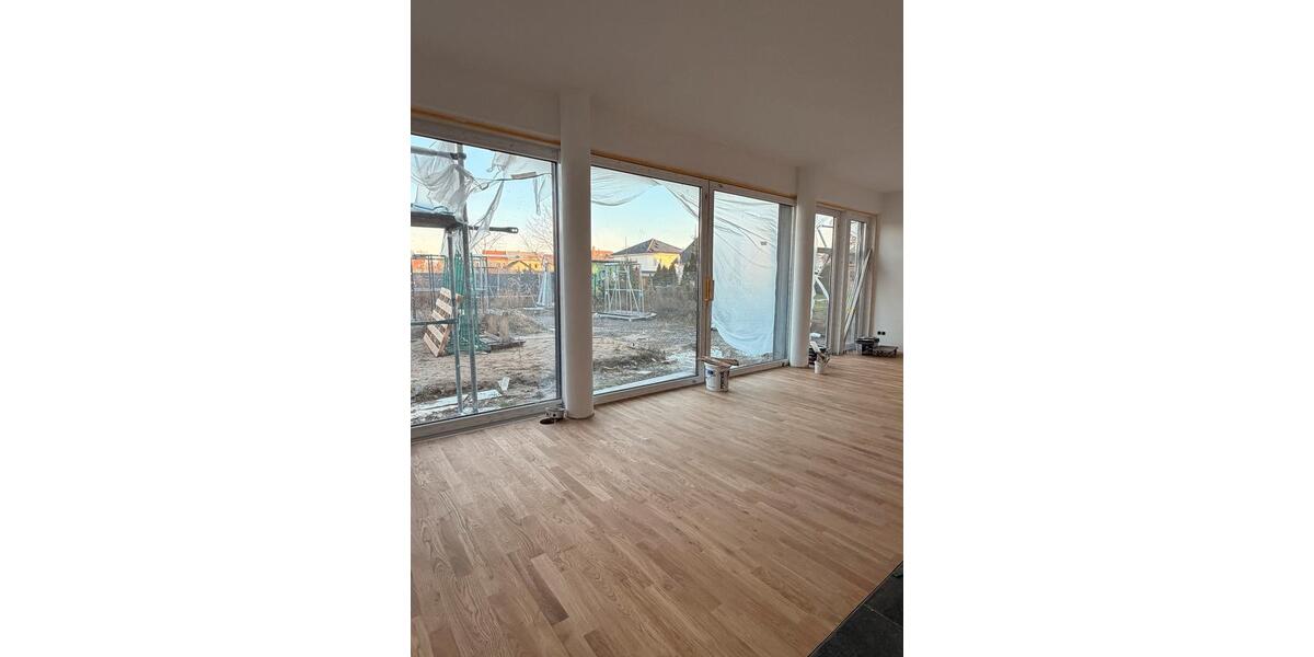 Neubau: Exklusive 5-Zimmer-Wohnung mit Garten, Kamin & Parkett 5 zimmer