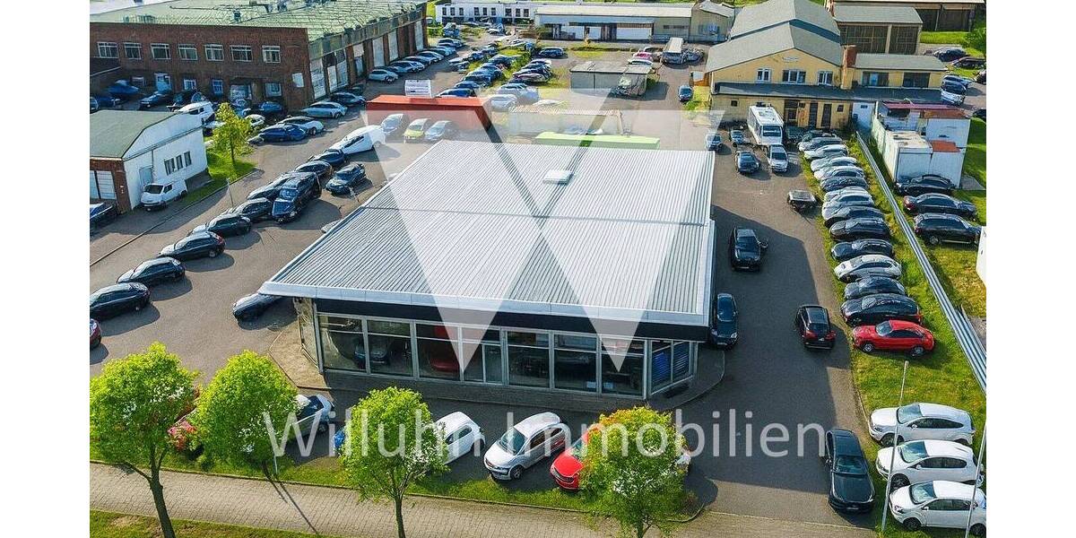 Gewerbegrundstück mit 2 Autohäusern I Lagerhallen I Werkstattgebäude I Freiflächen zimmer