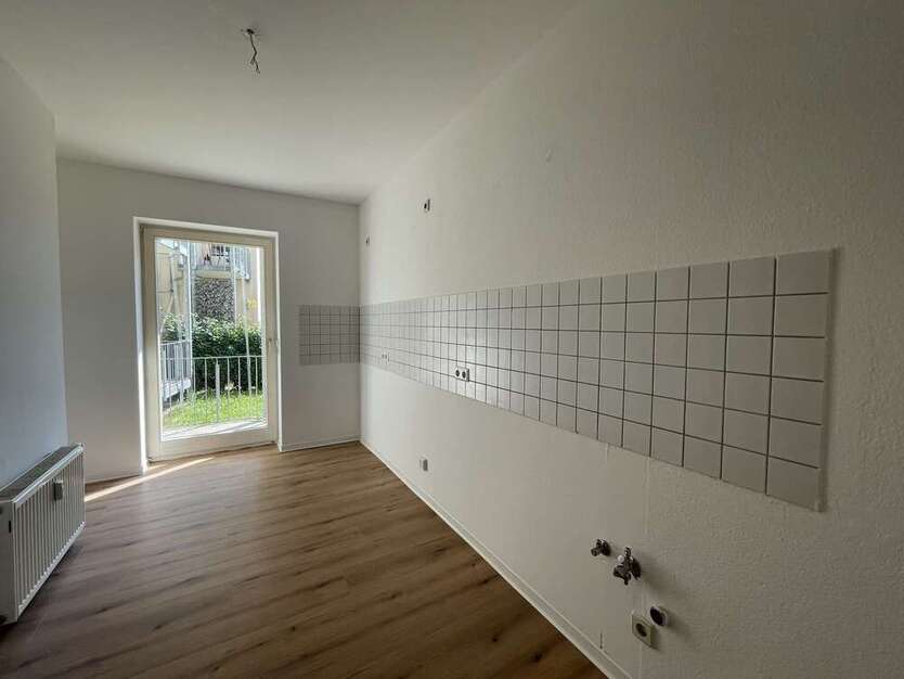 Sanierte Erdgeschoßwohnung mit Balkon!