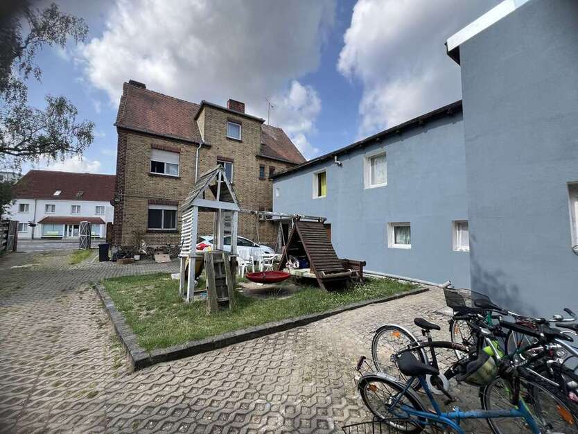 Wohn- und Geschäftshaus mit Sanierungspotenzial 18 zimmer