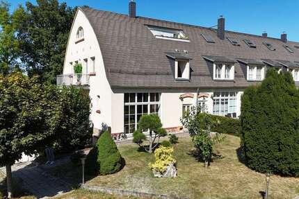 MaisonetteWohnung im historischen Hofgut Zöbigker mit Garten und Balkon, direkt am Cospudener See