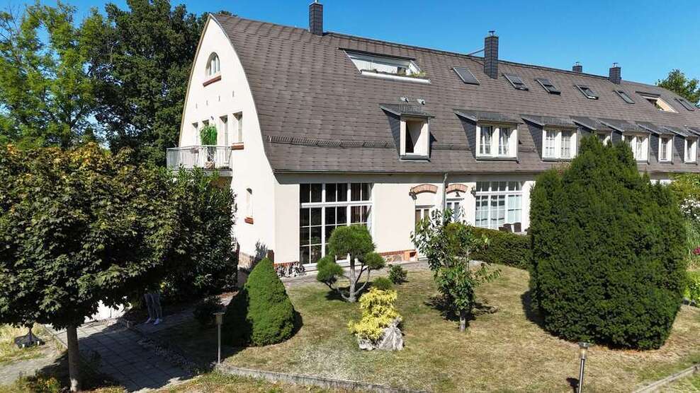 MaisonetteWohnung im historischen Hofgut Zöbigker mit Garten und Balkon, direkt am Cospudener See