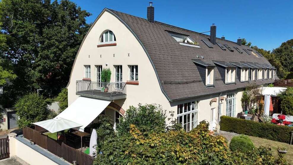 MaisonetteWohnung im historischen Hofgut Zöbigker mit Garten und Balkon, direkt am Cospudener See