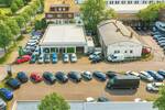 Gewerbegrundstück mit 2 Autohäusern I Lagerhallen I Werkstattgebäude I Freiflächen zimmer