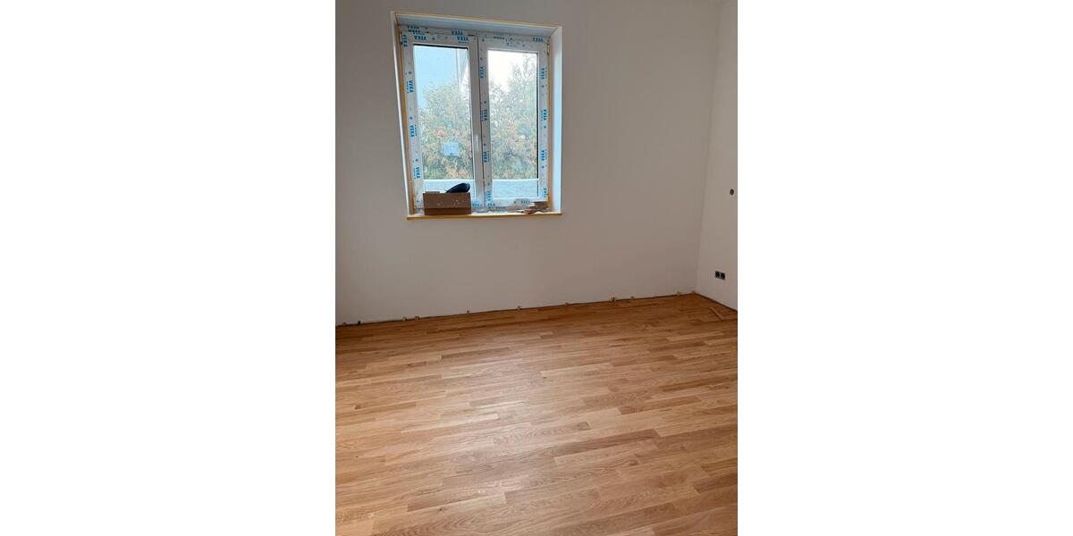 Neubau: Exklusive 5-Zimmer-Wohnung mit Garten, Kamin & Parkett 5 zimmer