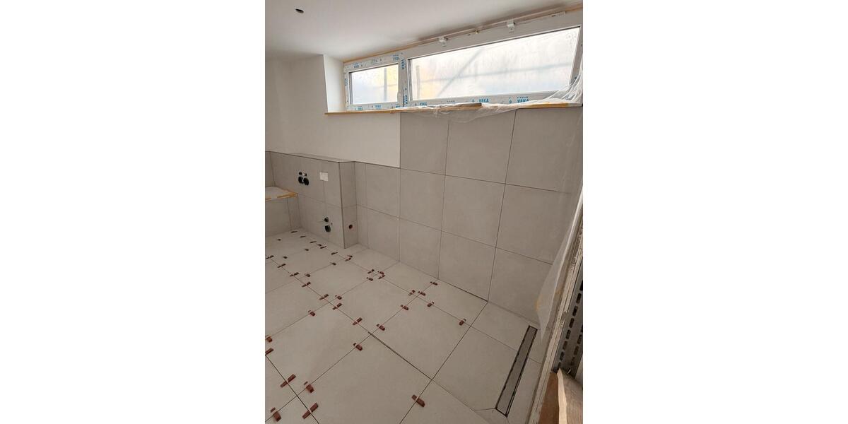 Neubau: Exklusive 5-Zimmer-Wohnung mit Garten, Kamin & Parkett 5 zimmer