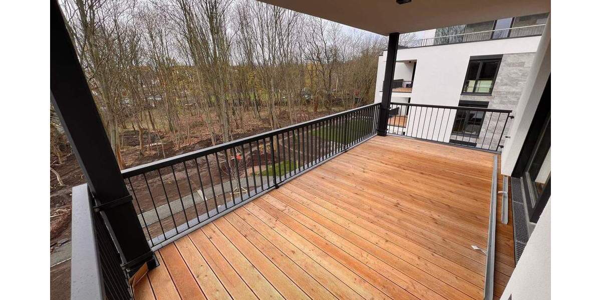 NEUBAU mit 5-Zimmern BLICK in den AUENWALD 70m² WOHNEN 2 x TERRASSEN KAMIN 2 x TG-SP ca. 7.000m² eingezäunter Gemeinschaftsgarten 5 zimmer