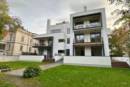 Exklusives Wohnen in der Stadtvilla! Große MaisonetteWohnung mit Kamin und hochwertiger EBK