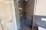 Erstbezug mit grünem Blick! + Parkett + Fußbodenheizung + Balkon + Wanne & Dusche + LED-Licht
