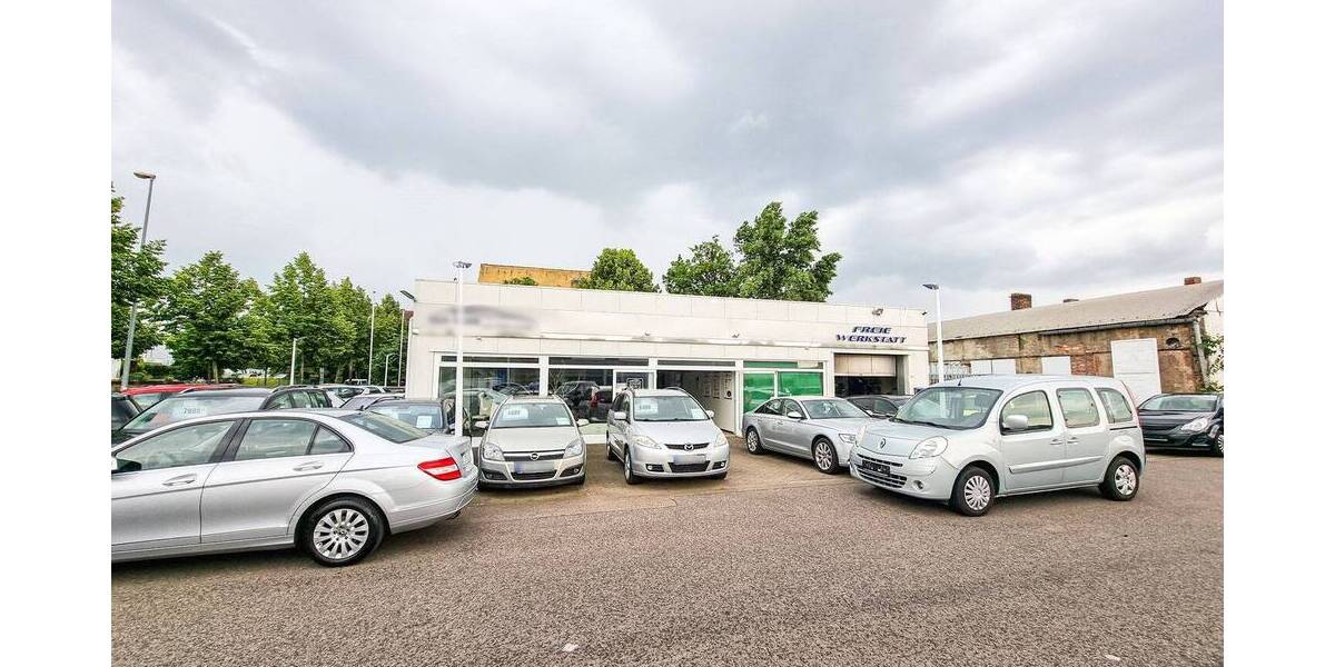 Gewerbegrundstück mit 2 Autohäusern I Lagerhallen I Werkstattgebäude I Freiflächen zimmer