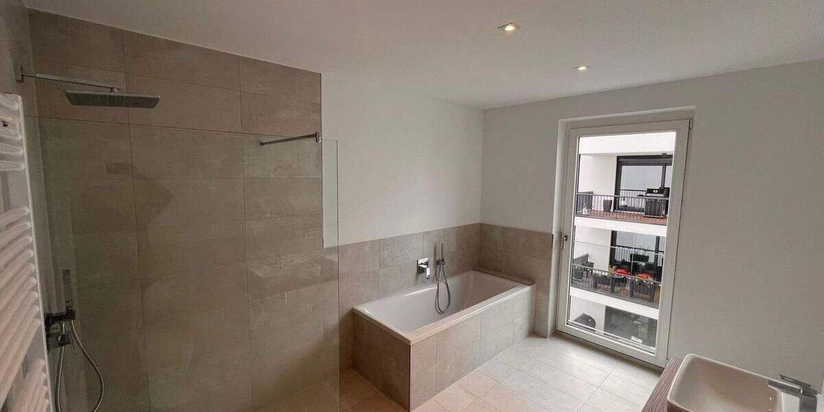 NEUBAU mit 5-Zimmern 70m² WOHNEN 2 x TERRASSEN BLICK in den AUENWALD KAMIN 2 x TG-SP ca. 7.000m² eingezäunter Gemeinschaftsgarten 5 zimmer